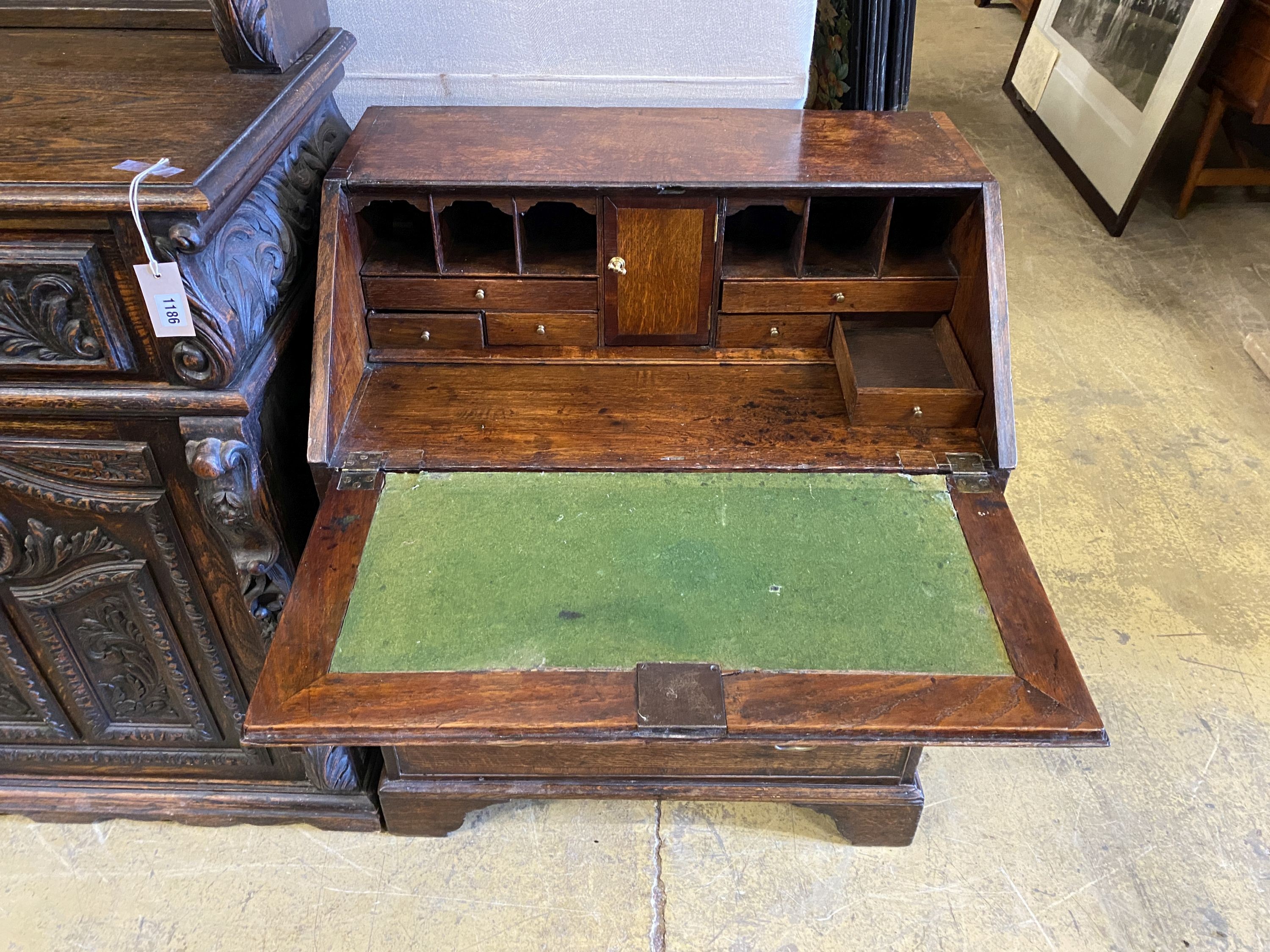 A small George III oak bureau, width 72cm, depth 47cm, height 88cm